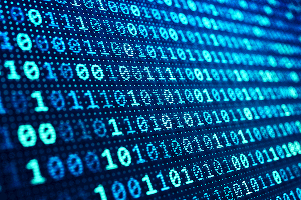 A close up photo of a screen with the numbers 0 and 1 randomly scattered across the screen in rows. They are in various shades of blue.